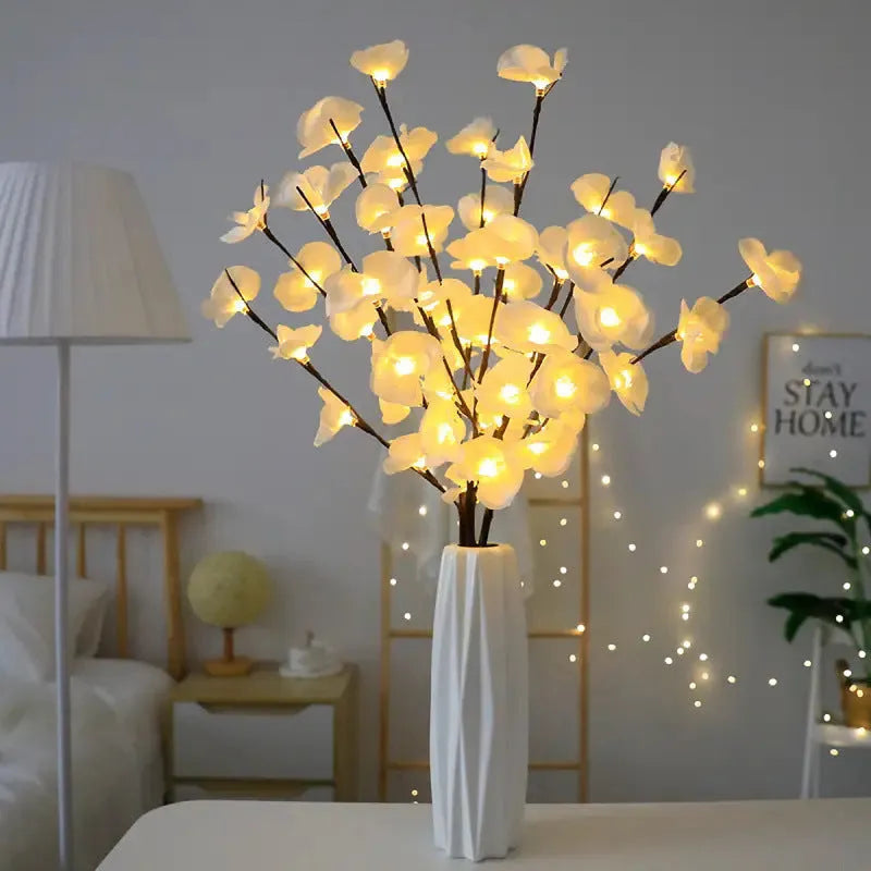 Pink LED phalaenopsis branch decorative light, 65 cm long, for indoor bedroom use.