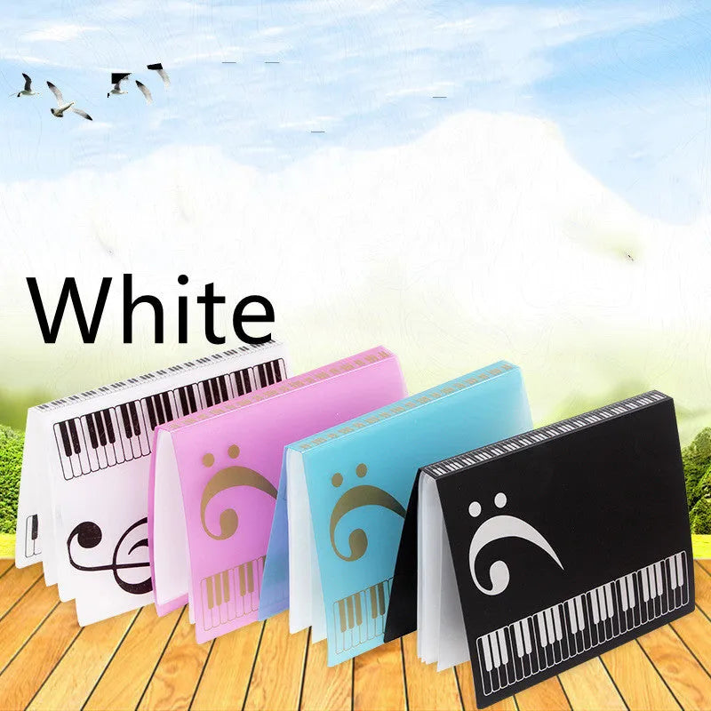 Black ABS plastic piano music folder with transparent sheet music inserts visible inside.