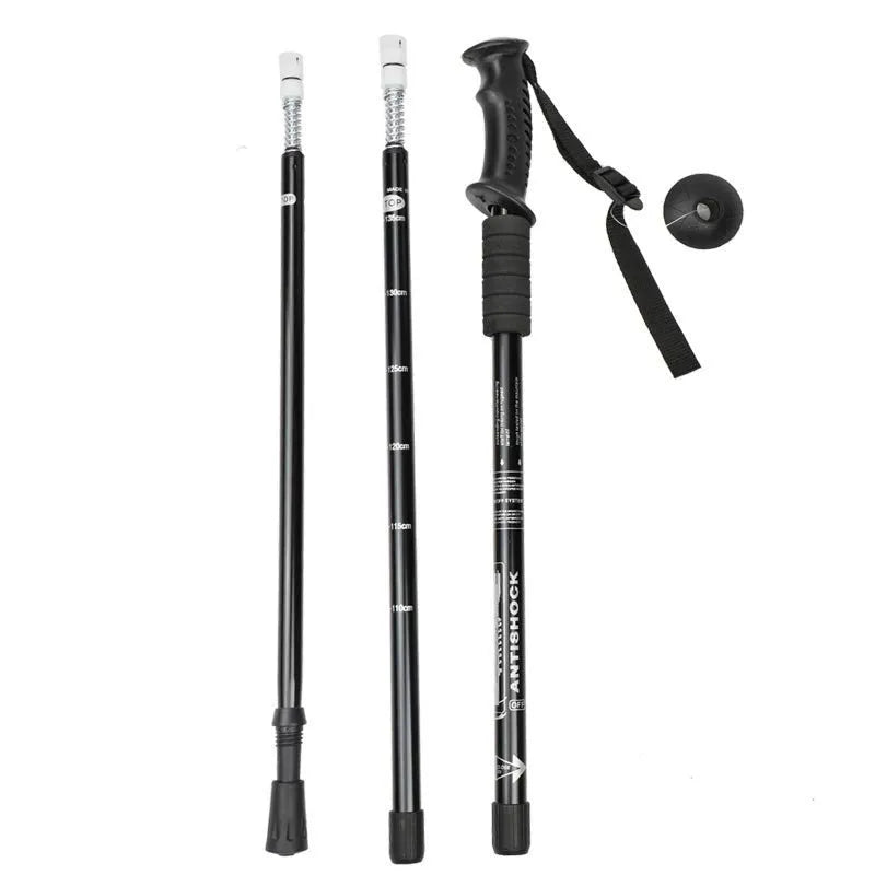 Aluminium telescopic trekking poles with multiple tip accessories in black, blue, silver, or red.