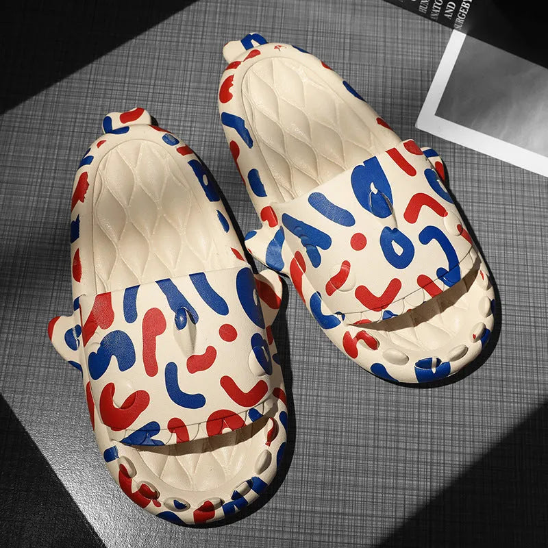 Casual open-toe EVA home slippers with a cute shark design on the upper.