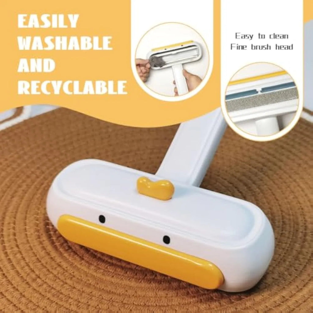 Yellow duck design portable pet hair remover tool with plastic body and bristles.