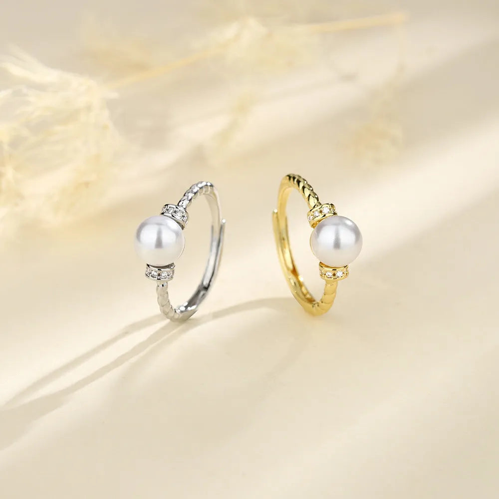 Adjustable antique twist geometric ring with pearl inlay in gold and silver copper
