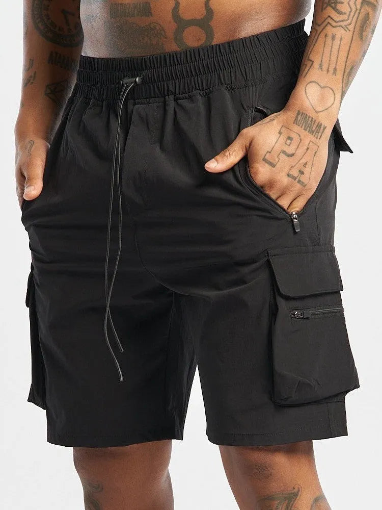 Men's black quick-dry sports shorts with elastic fabric for running and fitness activities