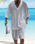 Men's grey knitted short-sleeved drop-shoulder top with matching shorts laid flat.