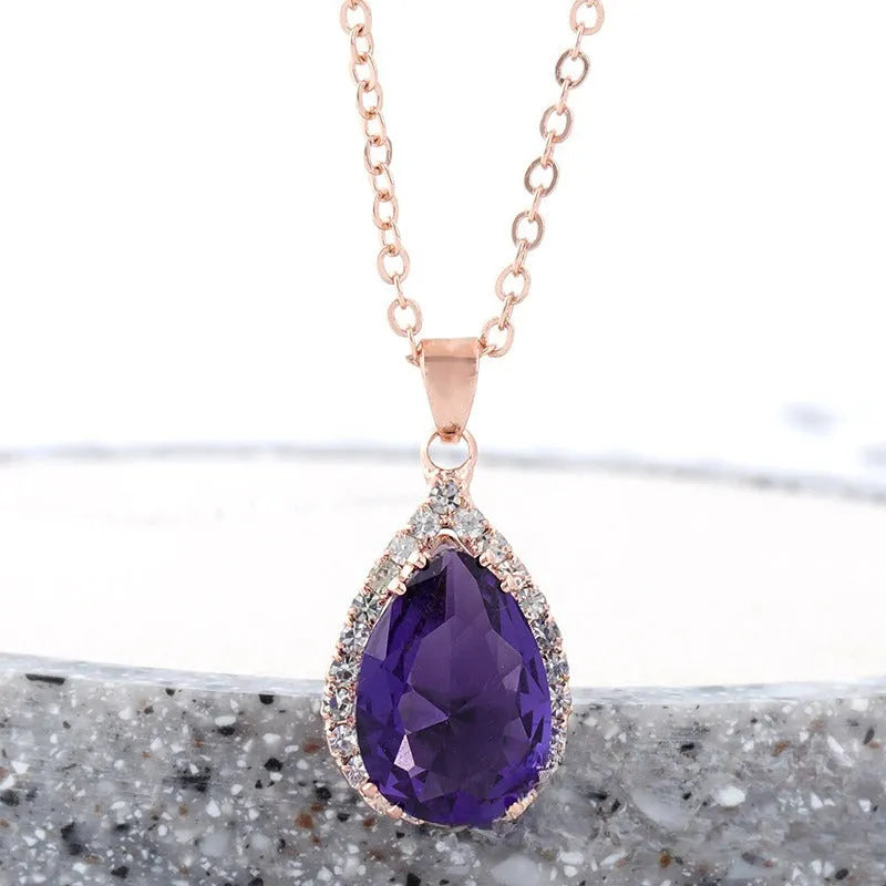 Rose gold geometric water drop pendant necklace with rhinestone inlay