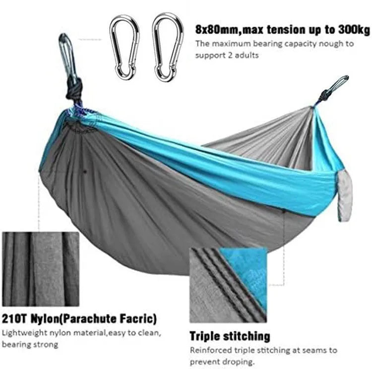 Blue parachute nylon outdoor hammock hung between trees, showing its 270cm length.