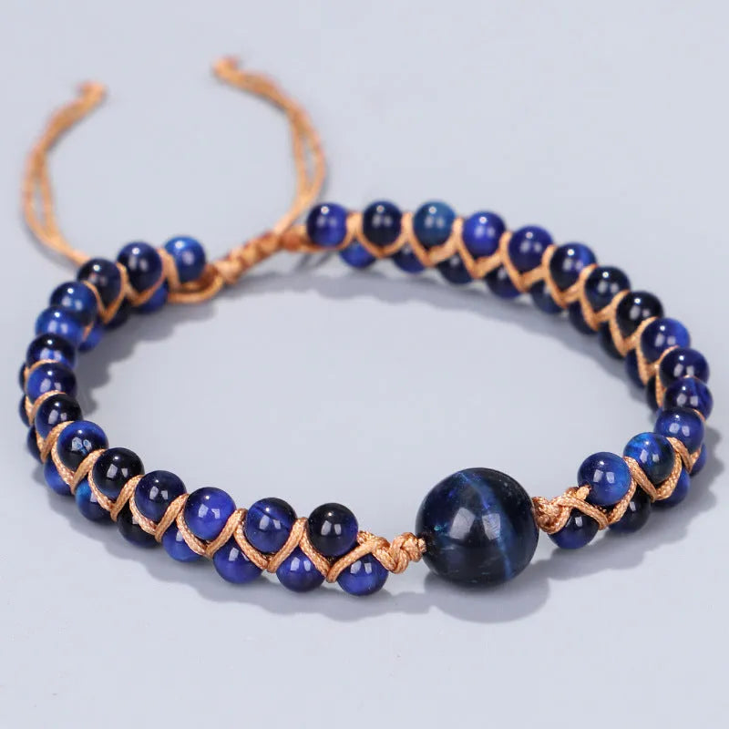 Hand-woven geometric pull bracelet with tigereye stone beads in blue or amethyst colour