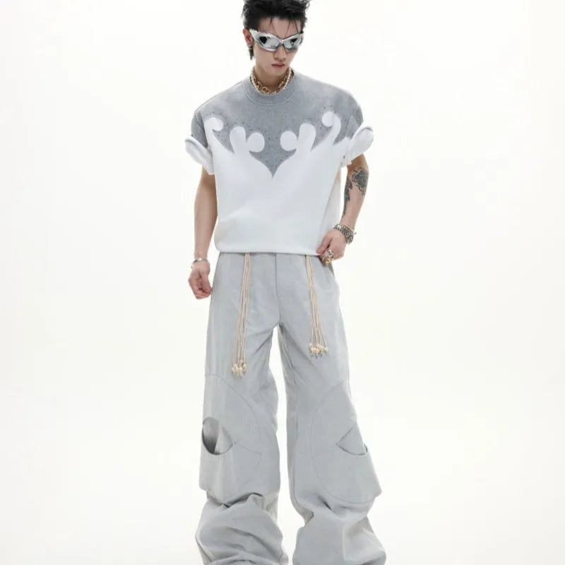 Men's grey loose fit cotton t-shirt with burnt flower stitching and rhinestone detail on the chest.