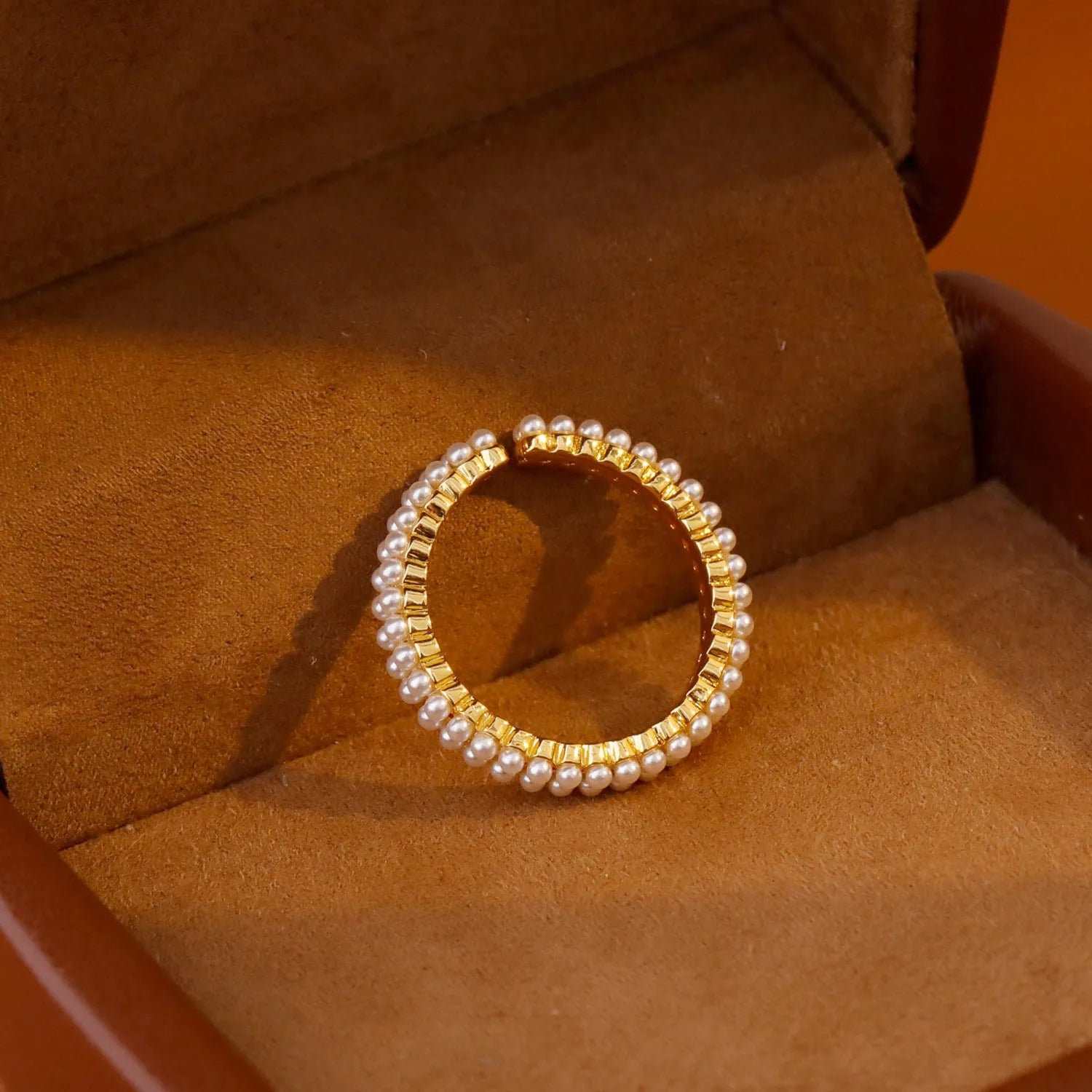 Gold geometric open mouth pearl ring for women with round elements and electroplated finish