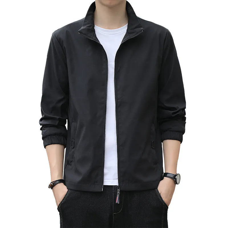 Men's Korean style loose lapel casual jacket in blue with zipper pockets.