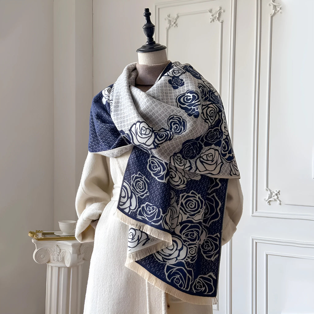 Long grey cashmere-like winter scarf with tassels, shown draped to display its length and texture.