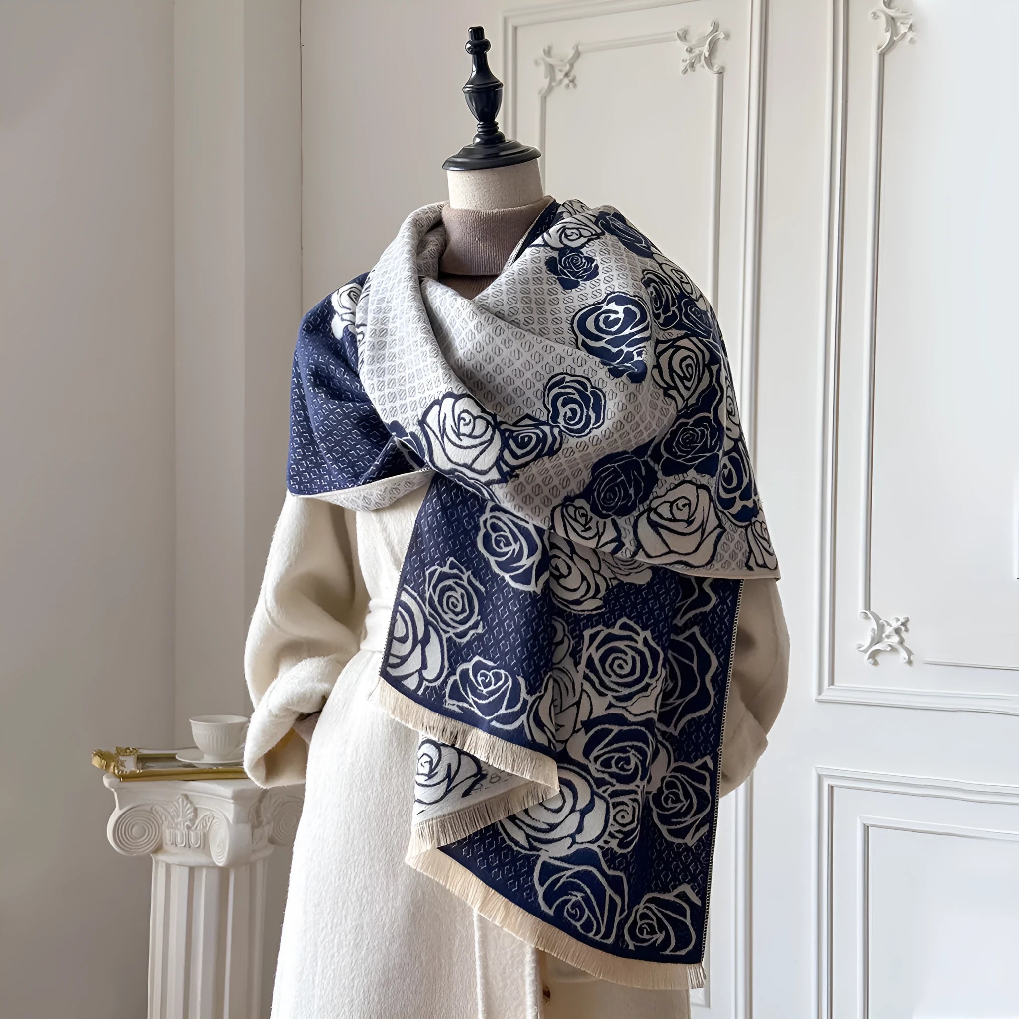 Long grey cashmere-like winter scarf with tassels, shown draped to display its length and texture.