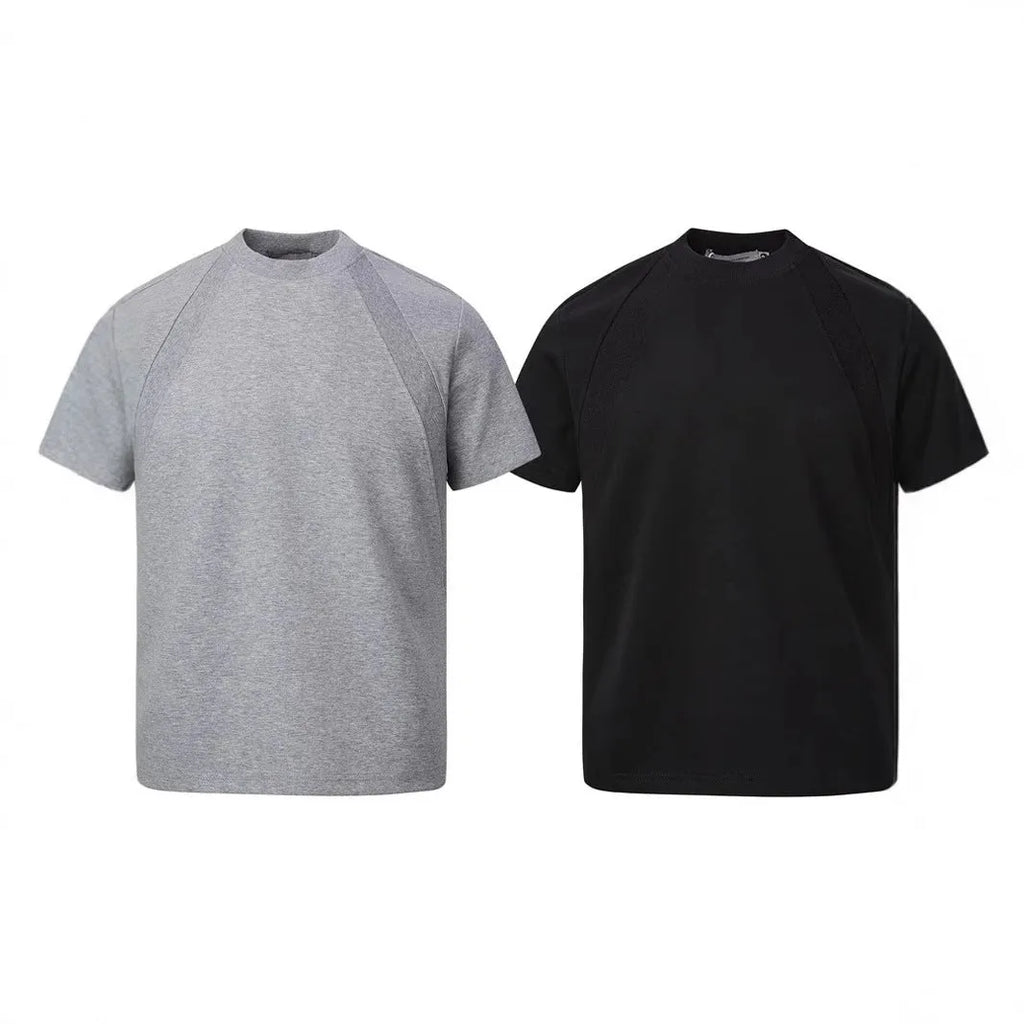 Loose fit short sleeve polyester top in black, shown on a model