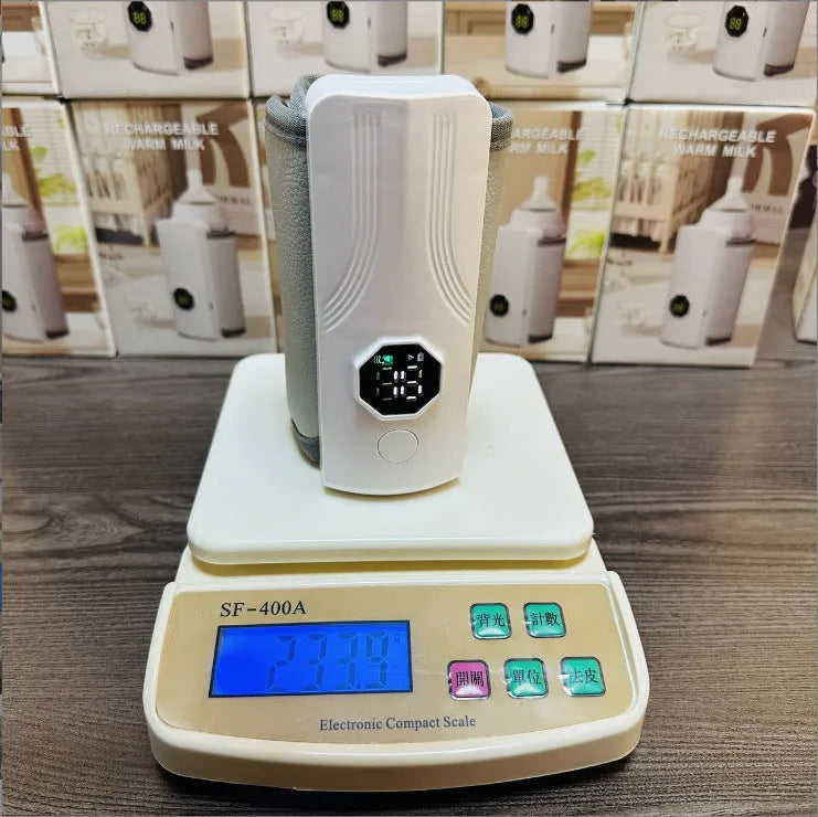 Grey and white car charger electric milk warmer with ABS polypropylene body and pu leather cover.