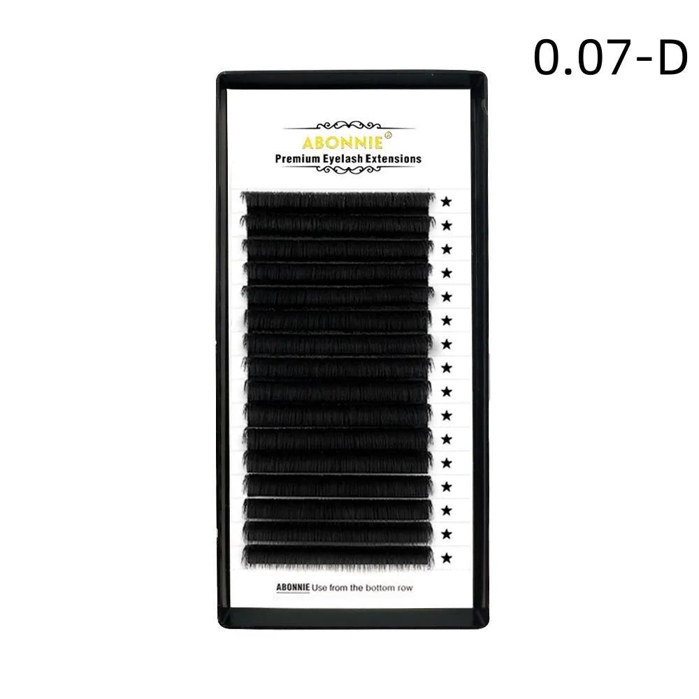 Close-up of 16-row dense mink hair false eyelashes on a matte round wool band.