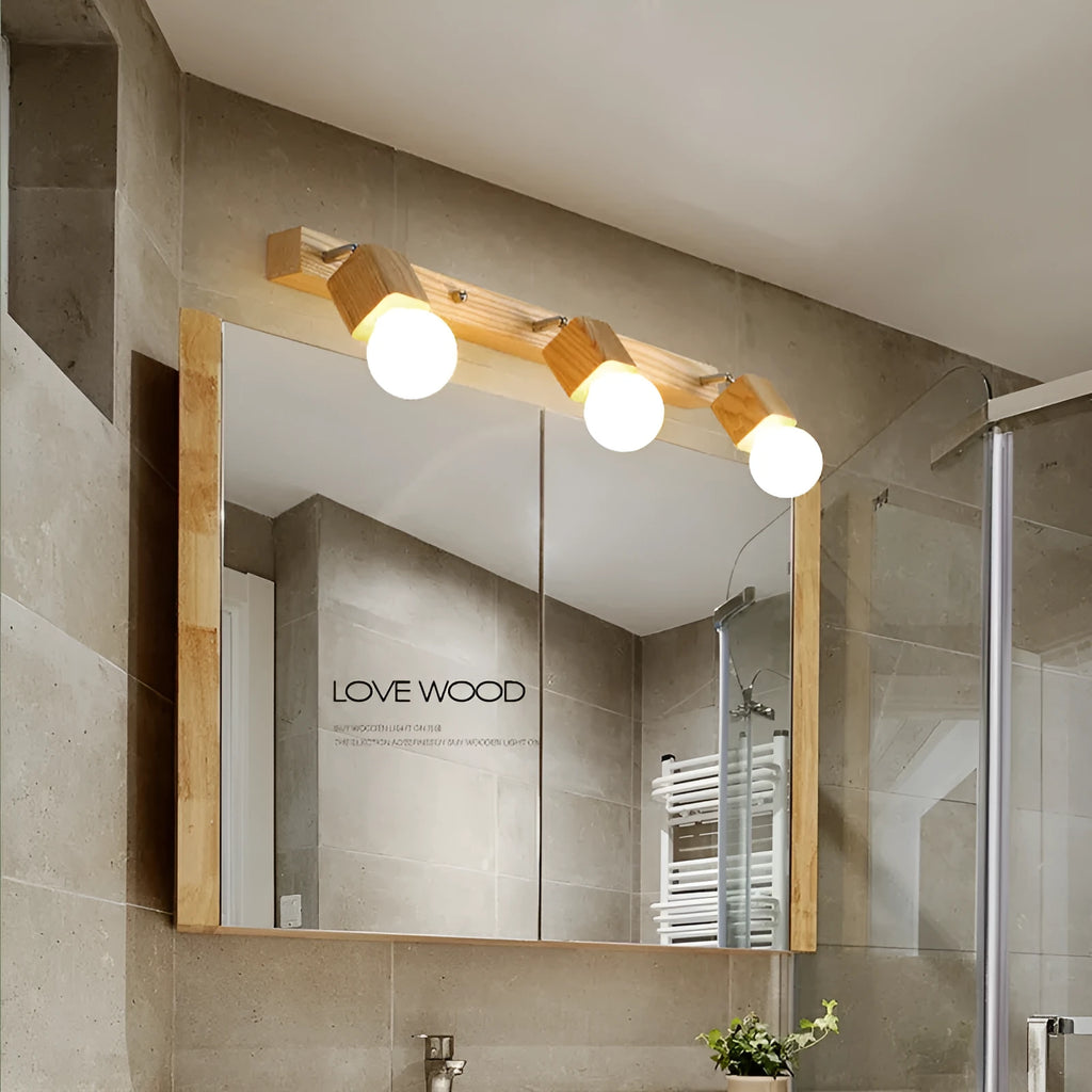 Compact one-head LED wall lamp with a 24cm diameter on a white wall.