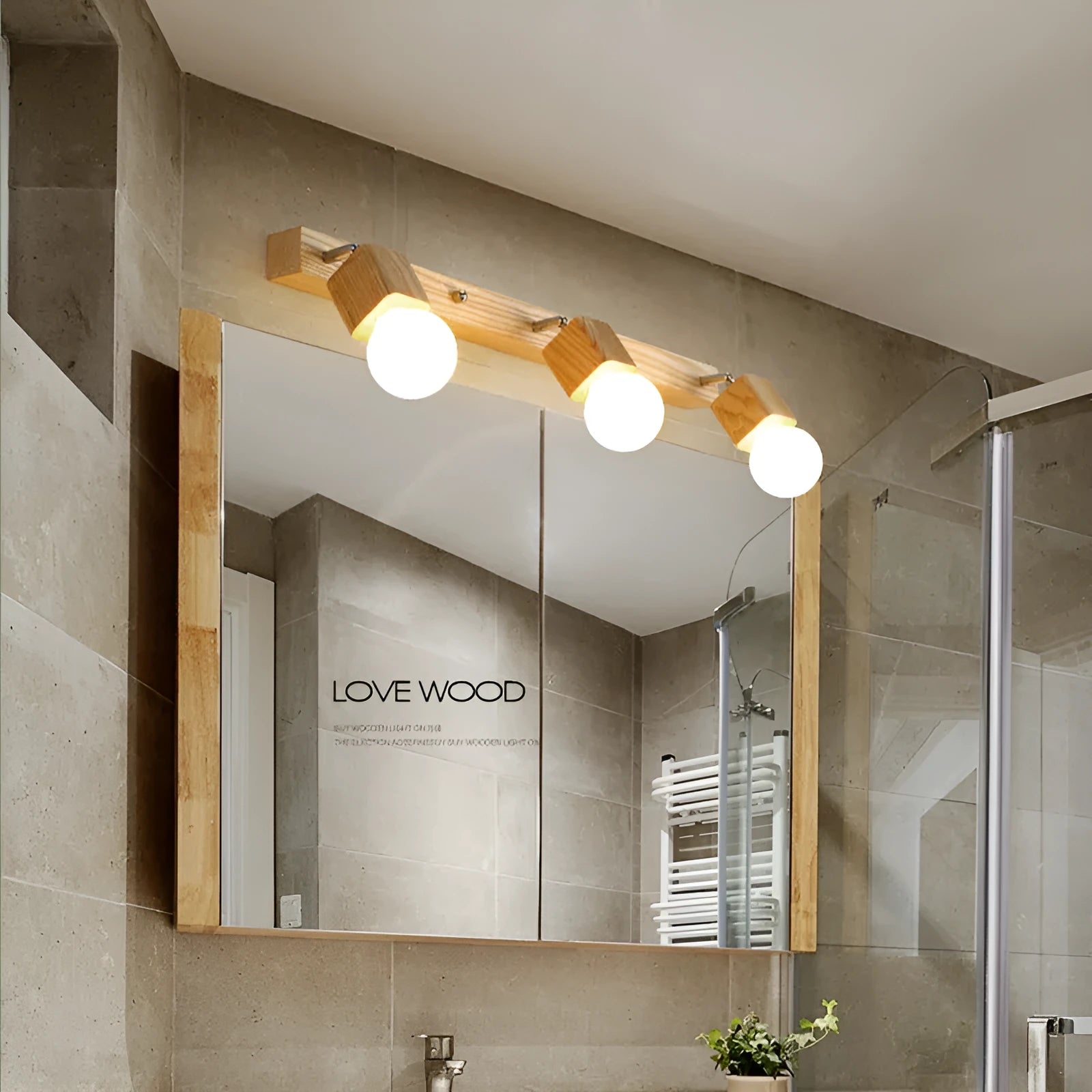 Compact one-head LED wall lamp with a 24cm diameter on a white wall.