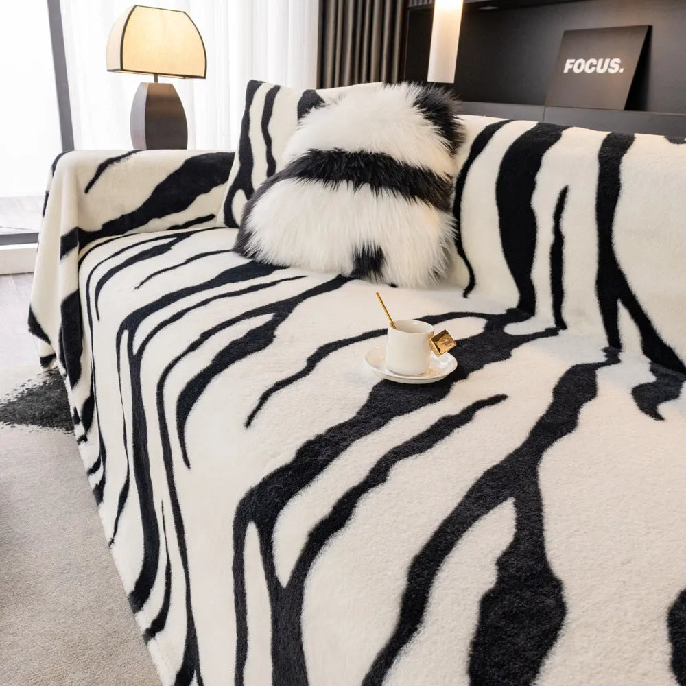 Zebra pattern flannel sofa cover with matching pillowcase in a light luxury style.