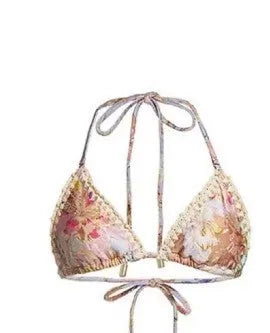 Women's creamy-white floral pattern bikini suit with matching skirt