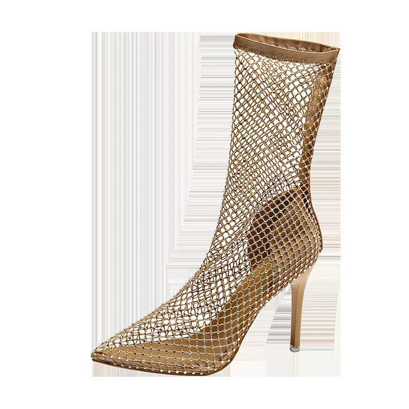 Gold women's high heel sandals with mesh upper, pointed toe, stiletto heel, and oversleeve design.