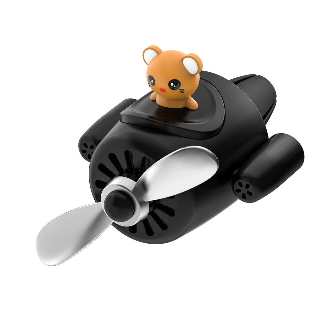 Cartoon small aeroplane shaped plastic car vent aromatherapy clip in black, blue, orange, or pink.