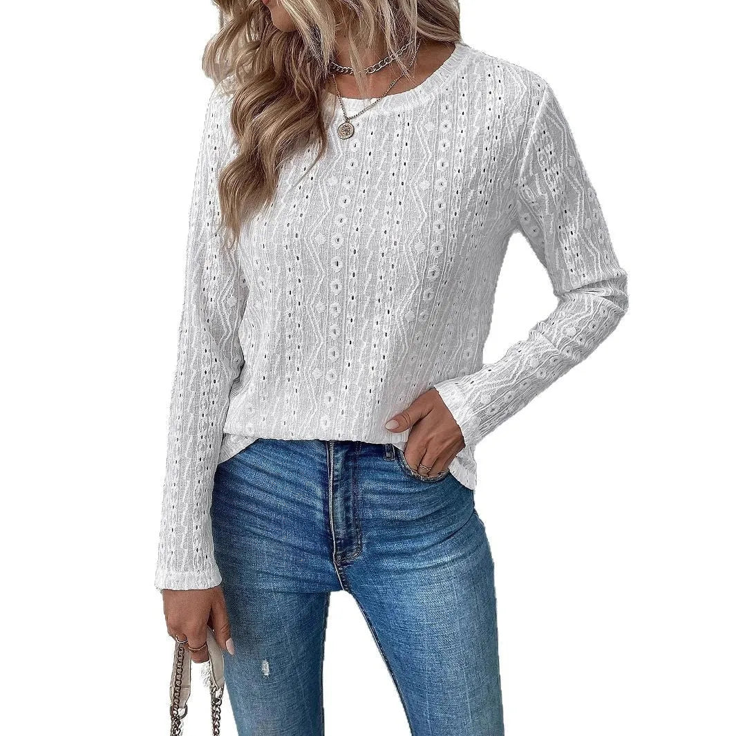 Women's white polyester top with round neck and long sleeves in loose pullover style