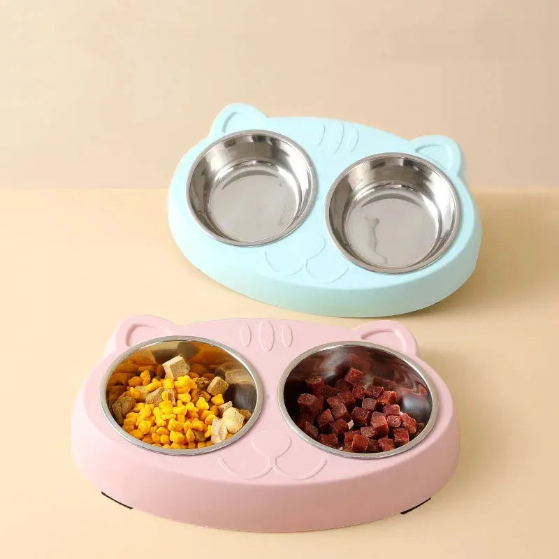 Blue macaron-shaped plastic pet feeder with two bowls for food and water