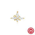 Sterling silver geometric kite-shaped earrings with a rhinestone-encrusted chain tassel in a gold colour finish.