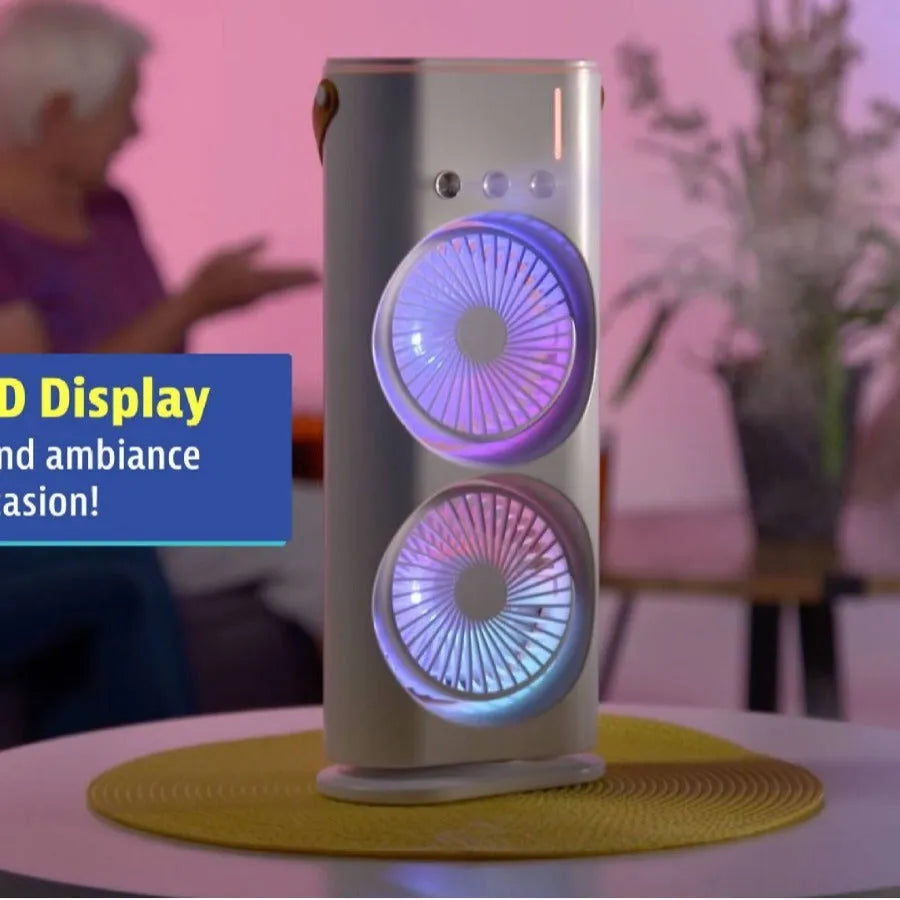 White double-ended portable USB fan with humidifying spray tank and remote control on a desk.