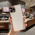 Gold stripe TPU protective case for iPhone shown in multiple colour options