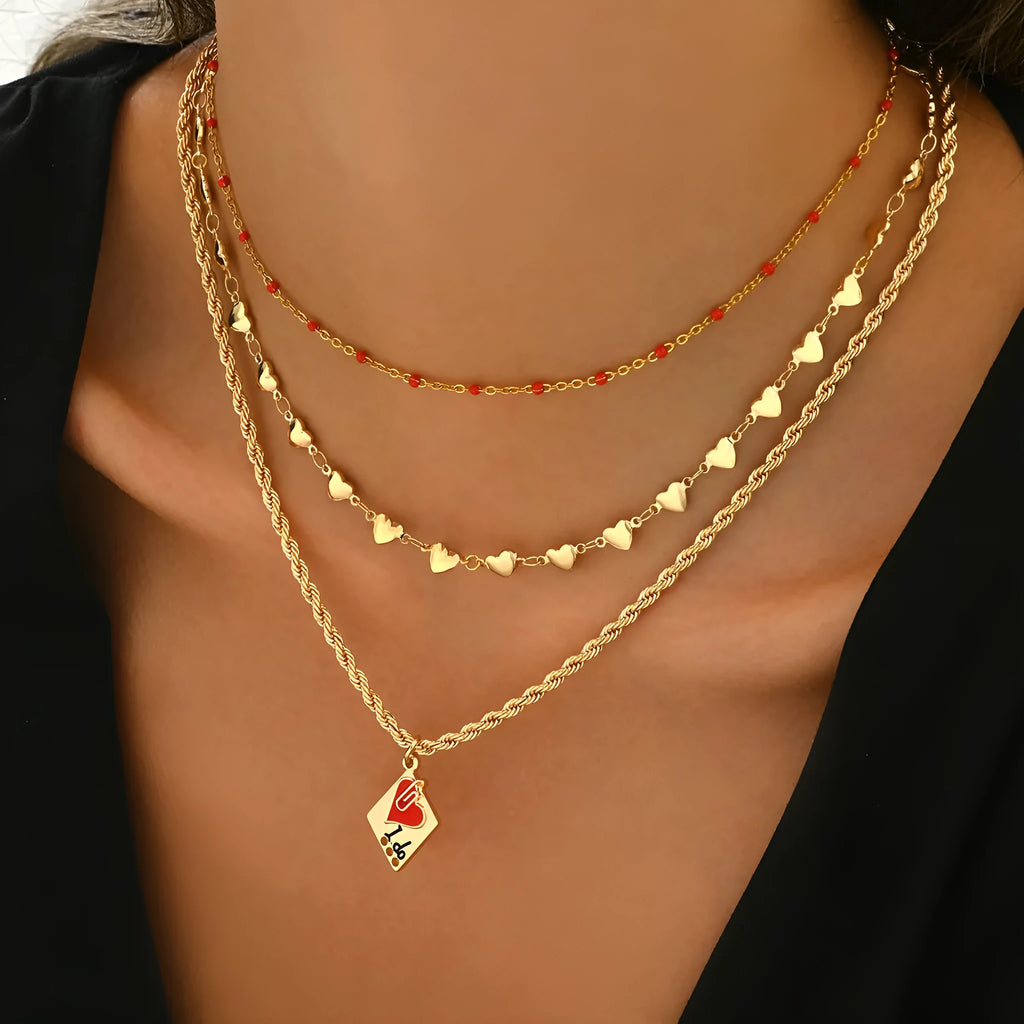 Three-layer geometric heart pendant on an adjustable zinc alloy clavicle necklace.