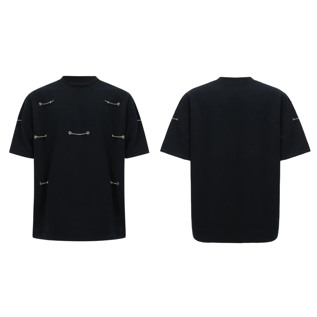 Black T-shirt with padded shoulders and metal chain detail on short sleeves