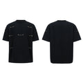 Black T-shirt with padded shoulders and metal chain detail on short sleeves
