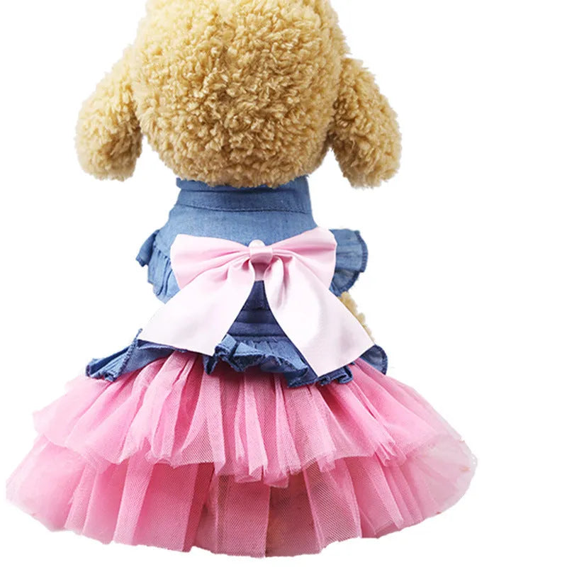 Korean-inspired pink denim pet skirt with a large bow on a dog model.