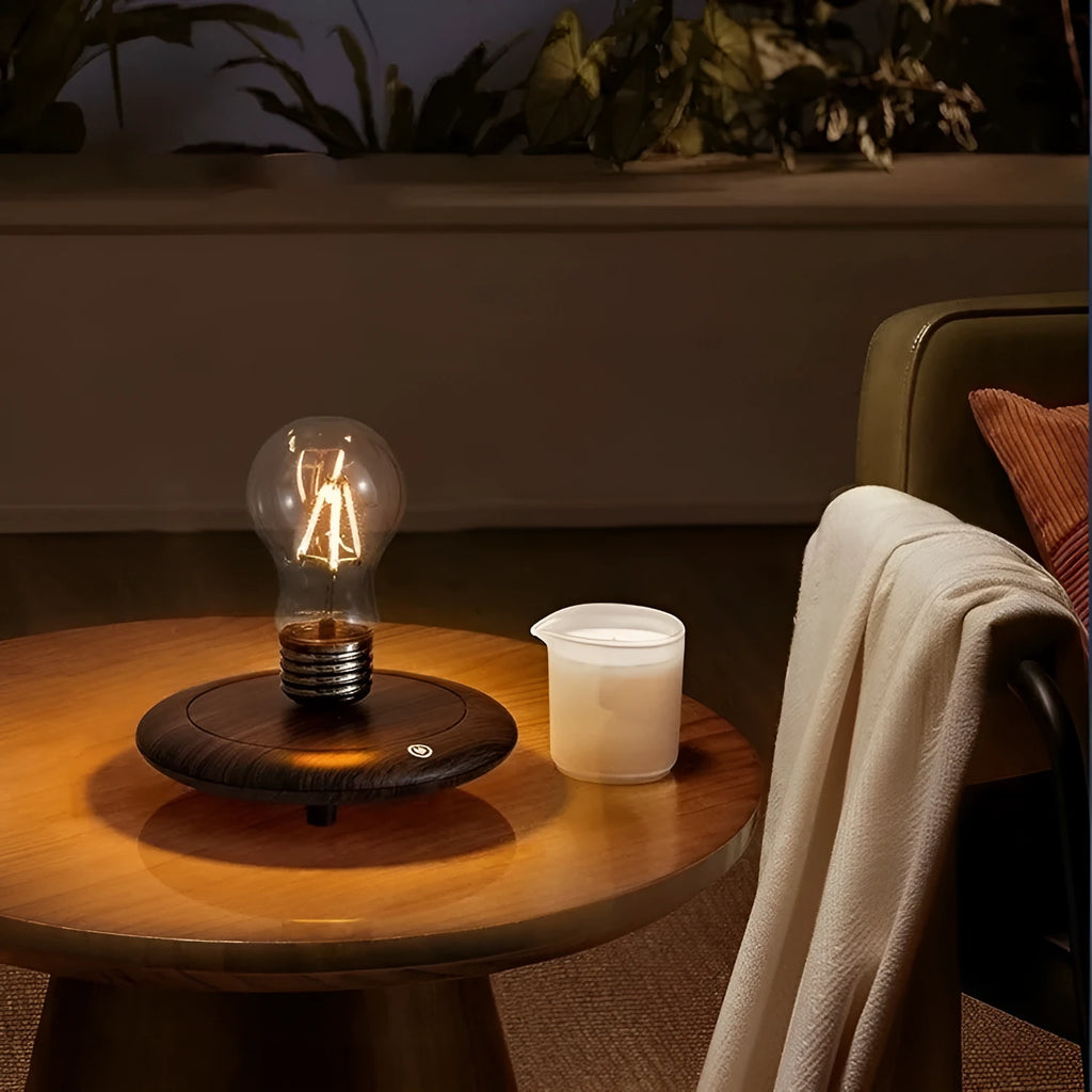 Creative small desktop night lamp with a suspension bulb and iron art body on a wood grain base.