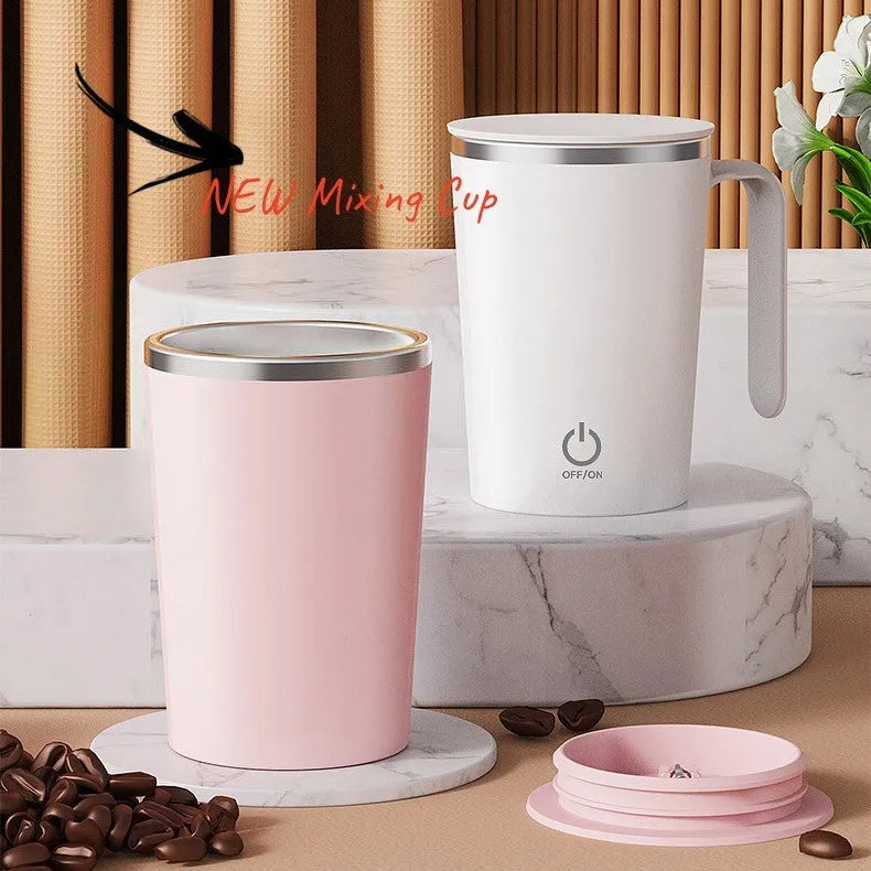 White automatic electric stirring cup with stainless steel finish and minimalist design on a table.