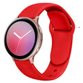 Samsung Galaxy Active 2 smartwatch with colourful silicone replacement strap featuring a reverse buckle.