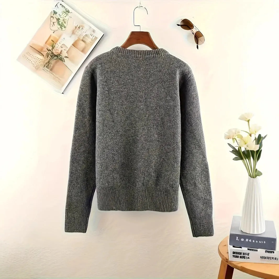 Dark grey women's button-front cardigan sweater with long sleeves on a hanger