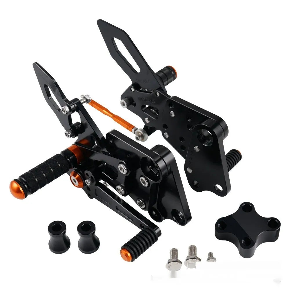 KTM Duke motorcycle raised footpeg support assembly in black and orange colours