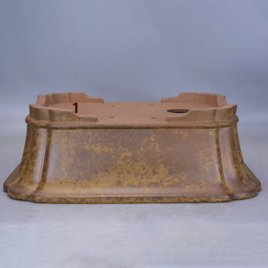 Large rectangular purple sand flowerpot with a double pumping angle design on a floor.
