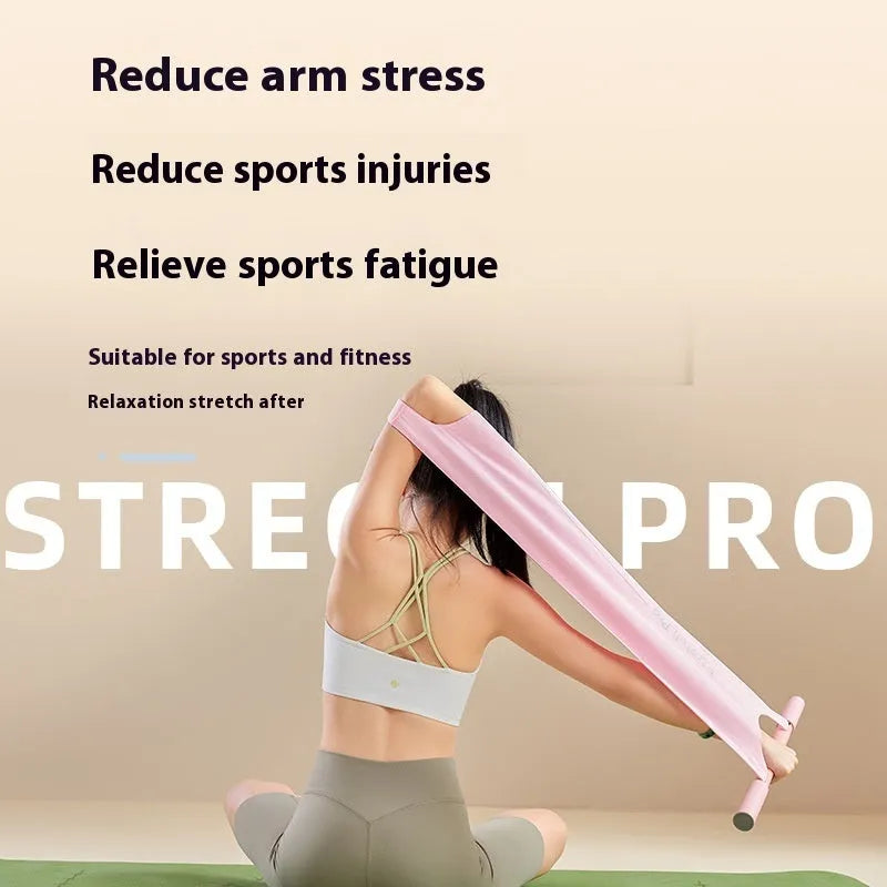 Grey and pink yoga stretching tool for shoulder, back and hip flexibility exercises.