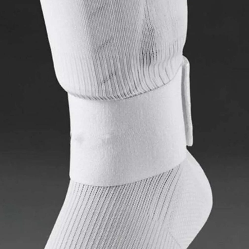 Elastic rubber football shin guard fixing belt showing red, blue, black and white colour options