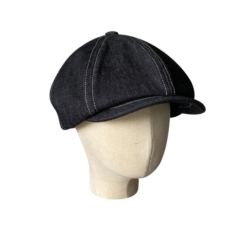 Black cotton beret with Japanese denim fabric texture shown in adult unisex sizing