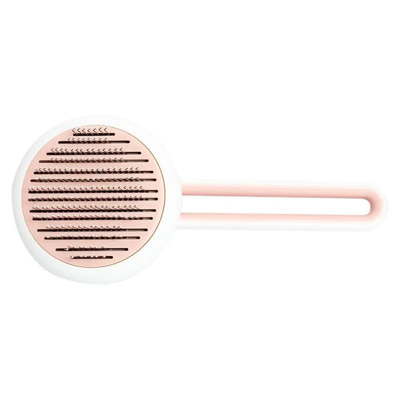 Automatic pet grooming brush with stainless steel pins in blue, green, or pink, showing the handle grip and release button.