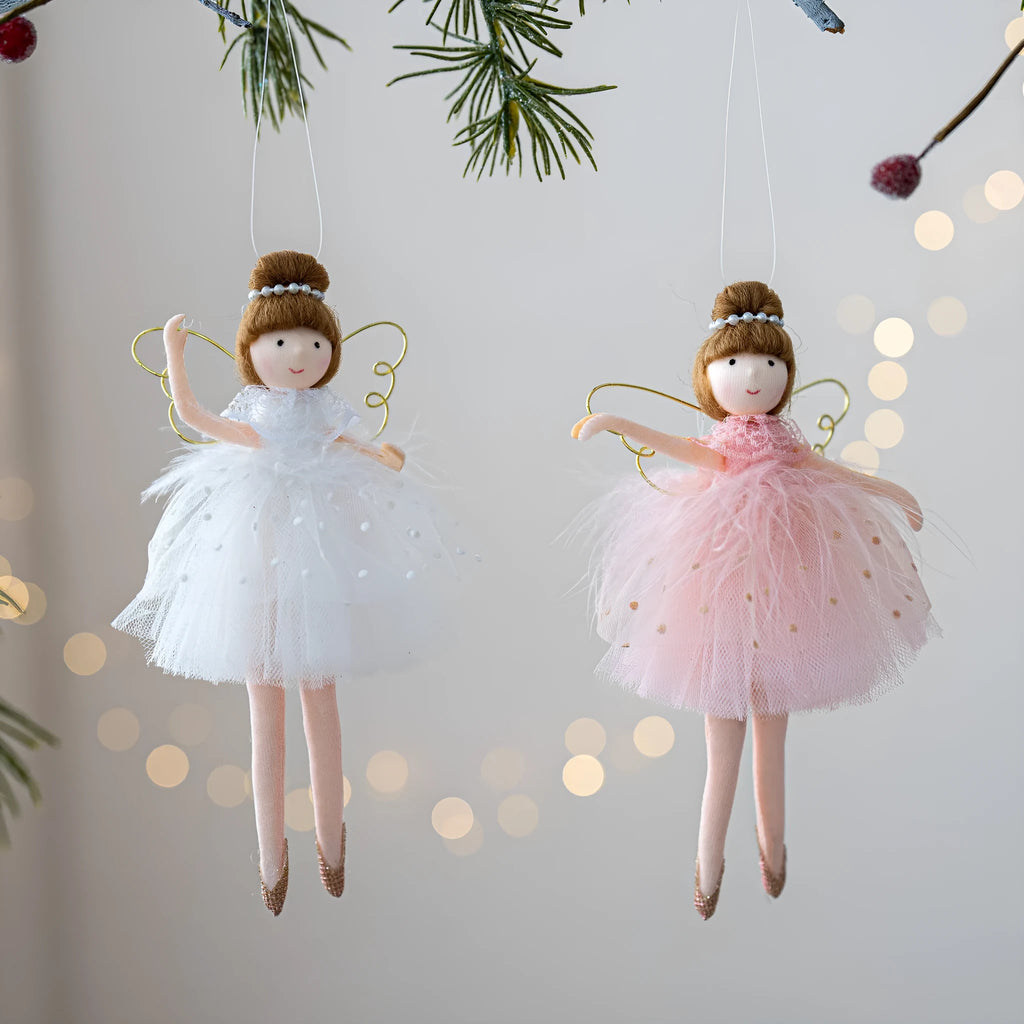 Pink and white cloth ballet girl angel plush doll pendant on a plain background.