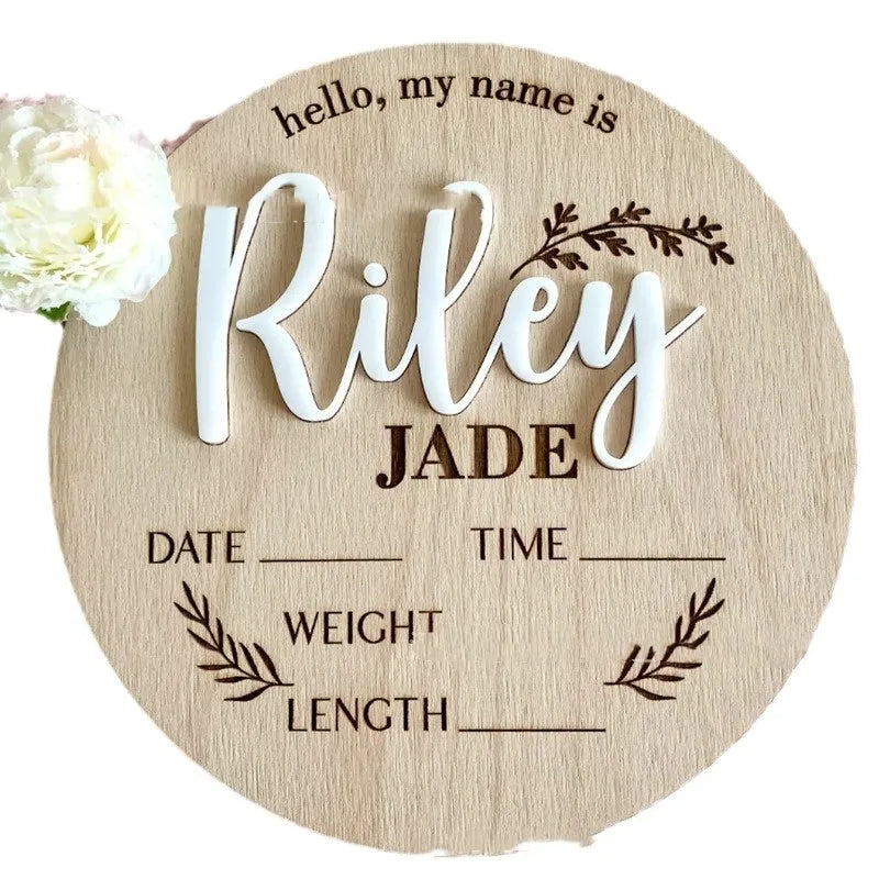 Square plywood newborn name label showing baby birth information, 15cm wide.