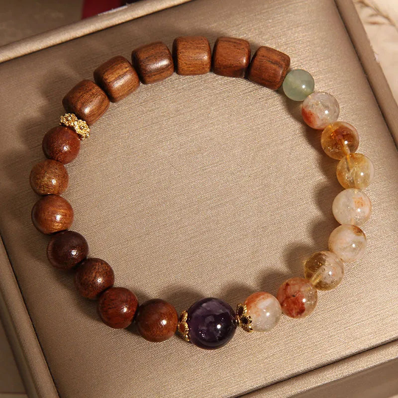 Women's crystal bracelet with yellow tower crystal and ebony amethyst beads featuring pearl accents