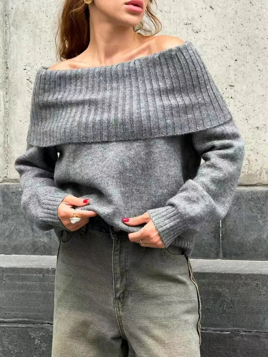 Grey off-the-shoulder women's sweater with a textured 3D rib knit pattern.