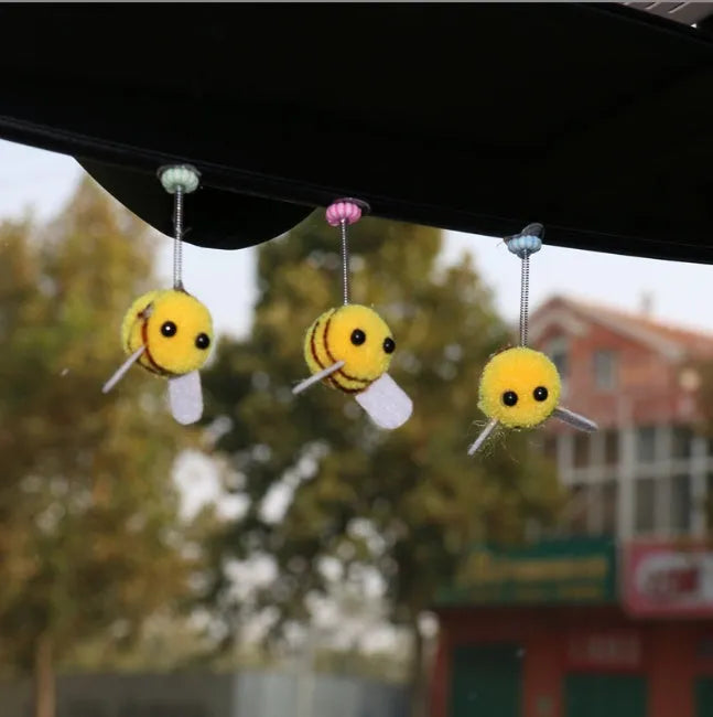 Cartoon bee car decoration with furry texture and swing spring on car dashboard