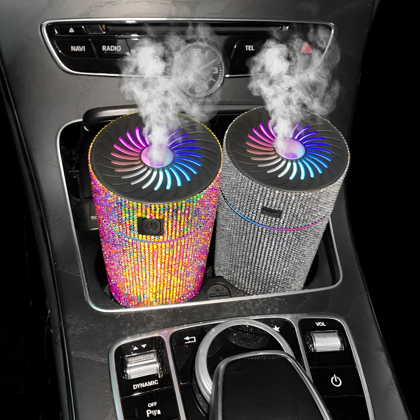 Compact white car air purifier humidifier with USB cord on car dashboard